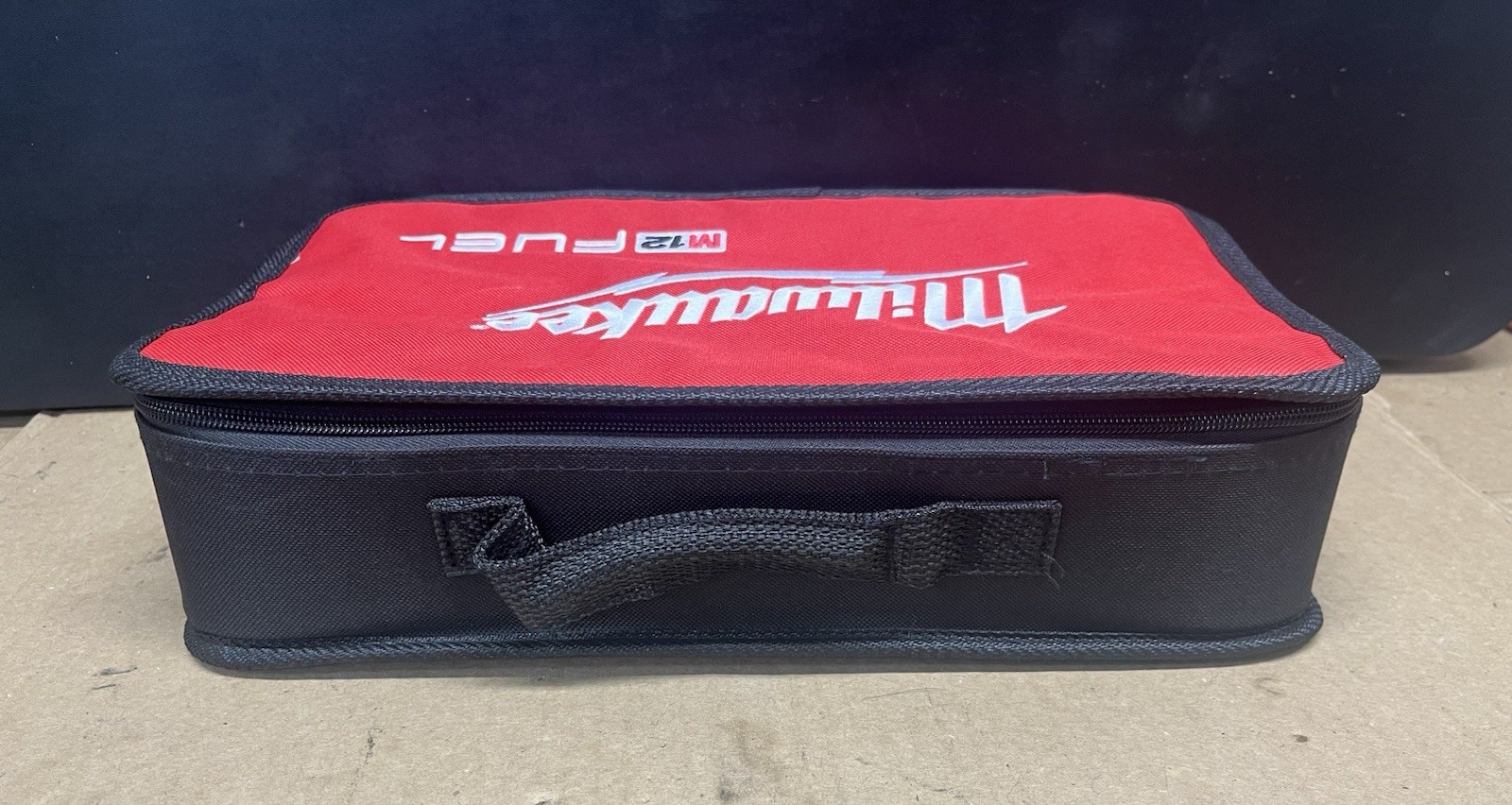 New Milwaukee Fuel M12 14” x 9” x 4” Heavy Duty Contractors Tool Bag W/ Charger