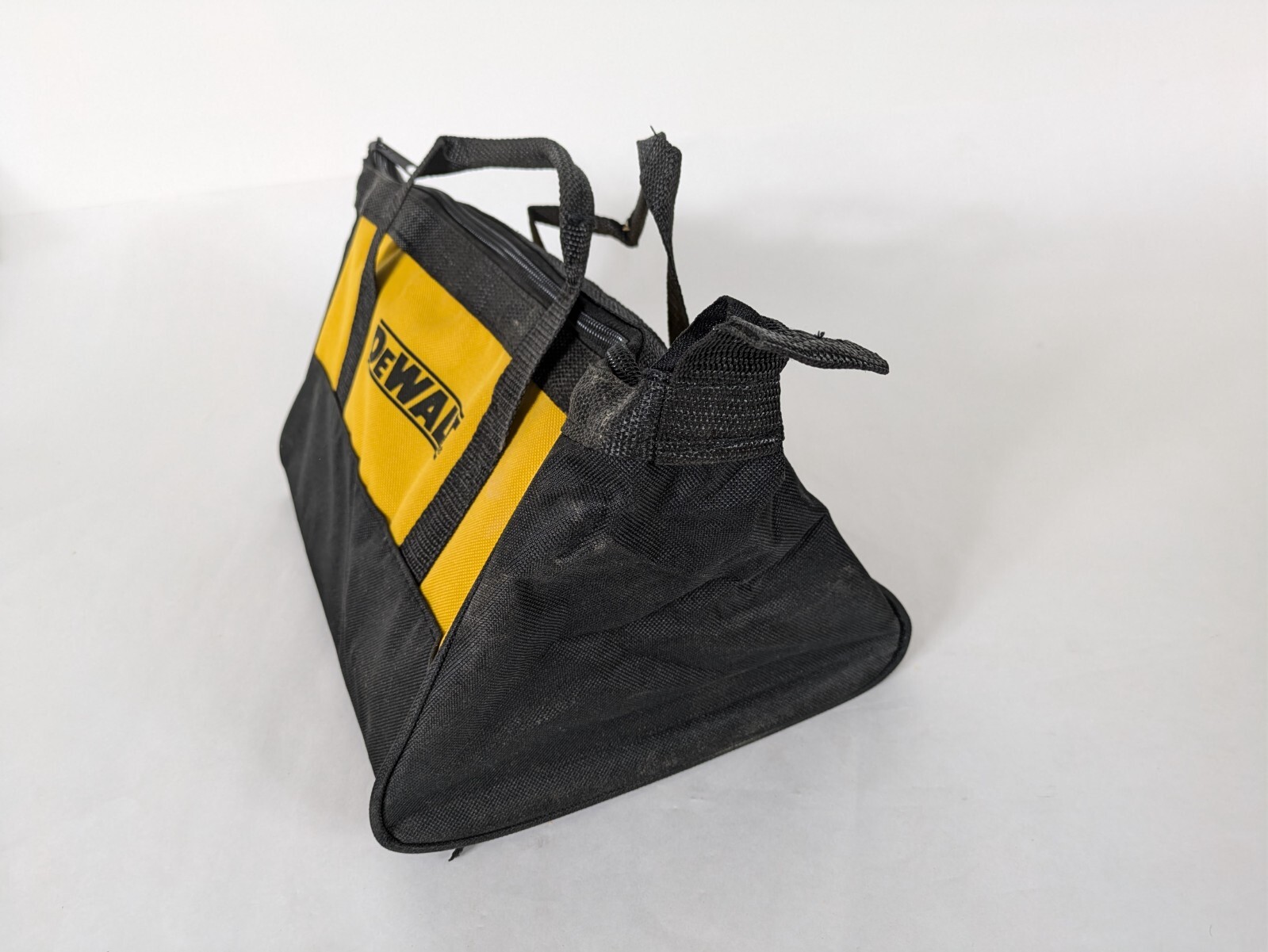 Small DeWalt Branded Tool Bag/ 11x9x7 inches tall/ triangular profile/ zipper