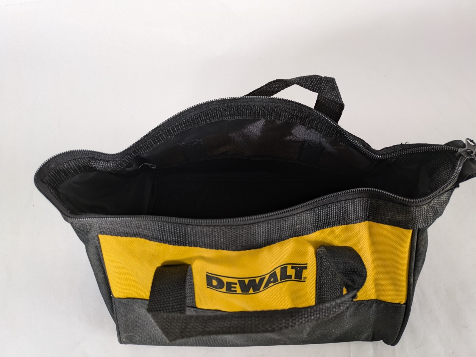 Small DeWalt Branded Tool Bag/ 11x9x7 inches tall/ triangular profile/ zipper