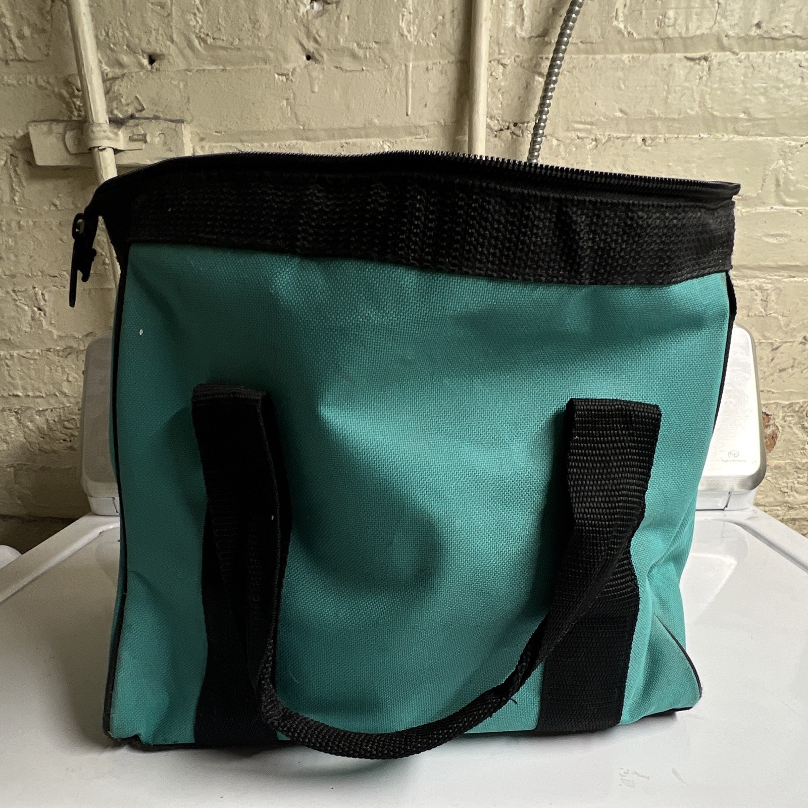 Makita Fabric Tool Bag Teal/Black w/ Handle, Zipper Closure, Single Item