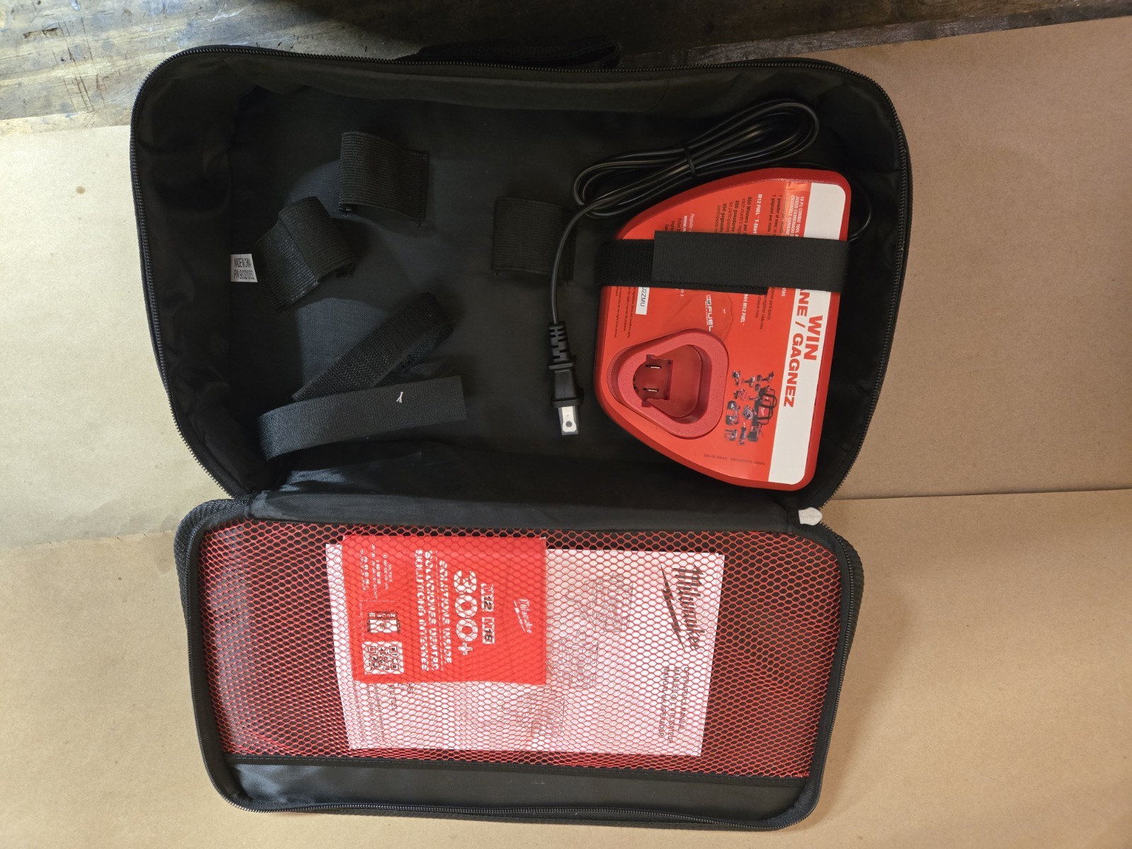 open Box Milwaukee M12 Fuel Soft Case with M12 charger