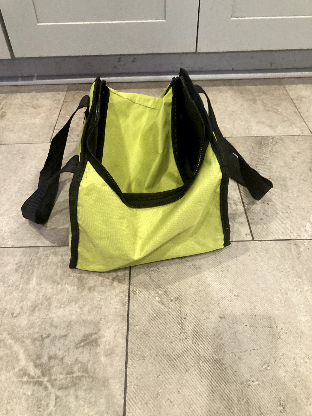 RYOBI Yellow-Green Tool Bag with Black Straps and Zipper Opening on Top 12×9.5in