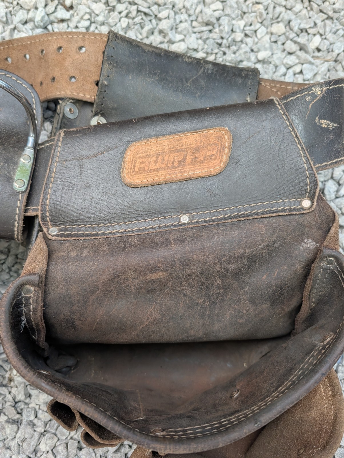 AWP HP brand carpentry tool belt featuring two pouches and one Craftsman pouch.