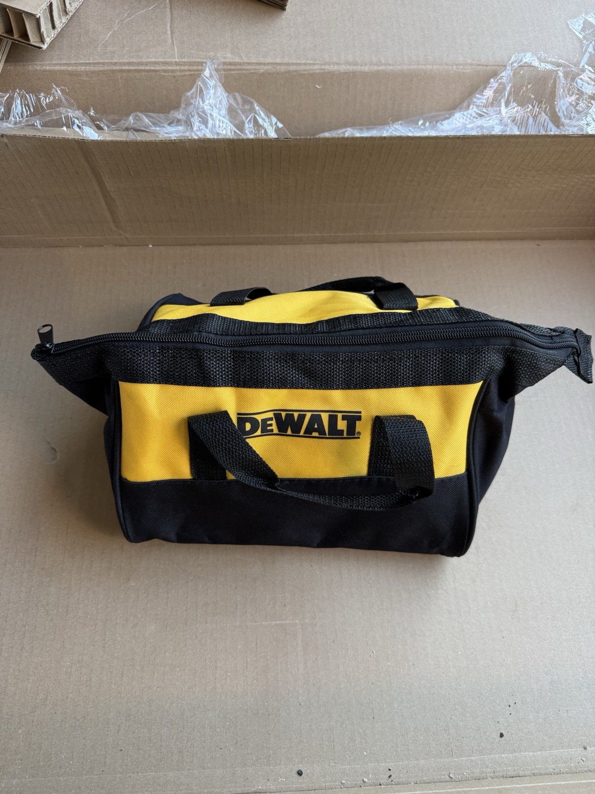 DEWALT Yellow and Black Fabric Tool Bag with Handle and Zipper Closure