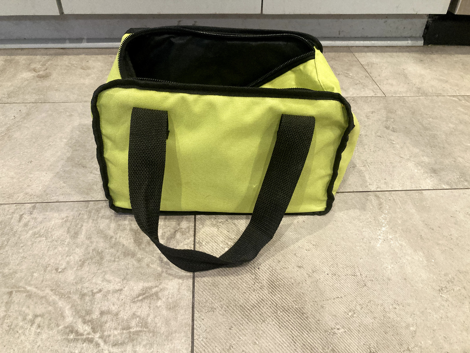 RYOBI Yellow-Green Tool Bag with Black Straps and Zipper Opening on Top 12×9.5in