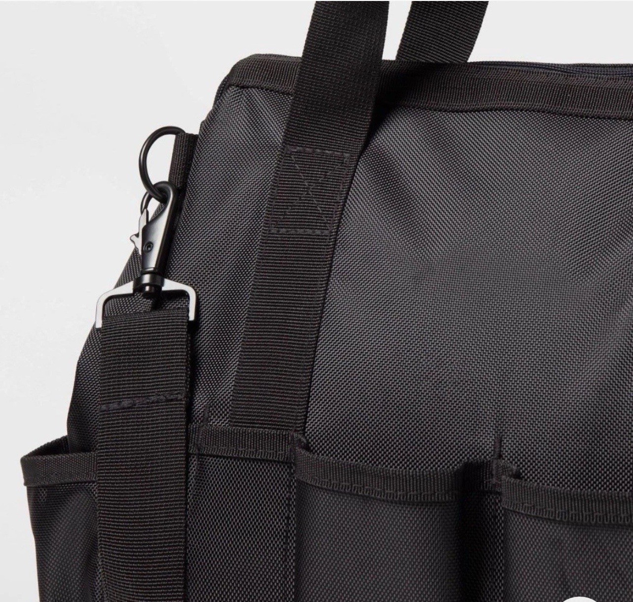The Heavy Duty Tool Bag is a versatile storage solution for organizing tools wit