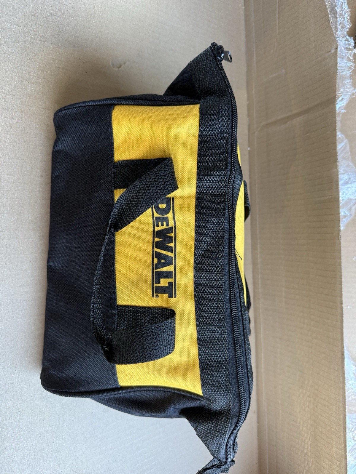 DEWALT Yellow and Black Fabric Tool Bag with Handle and Zipper Closure